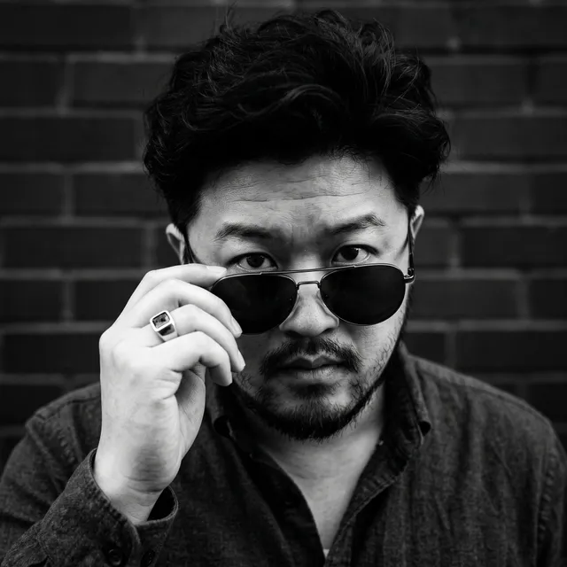 [UPLOAD YOUR IMAGE] A close-up, high-contrast black and w...