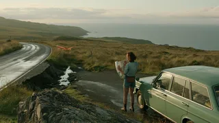 پرامپت استوری‌بورد با میدجرنی: Naturalistic cinematic road movie still, 16:9… - تصویر 3، ساخته‌شده با میدجرنی