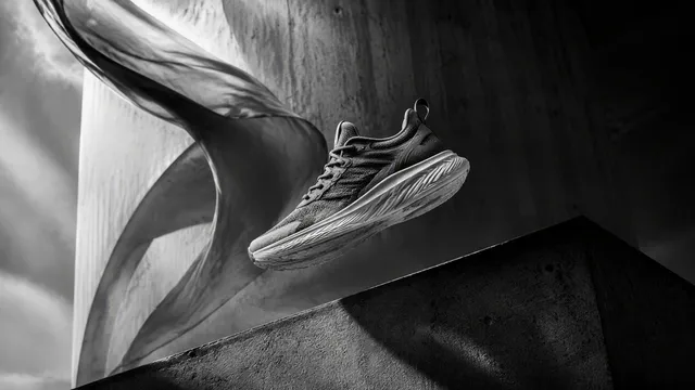 16:9 black-and-white cinematic commercial photograph, pre...
